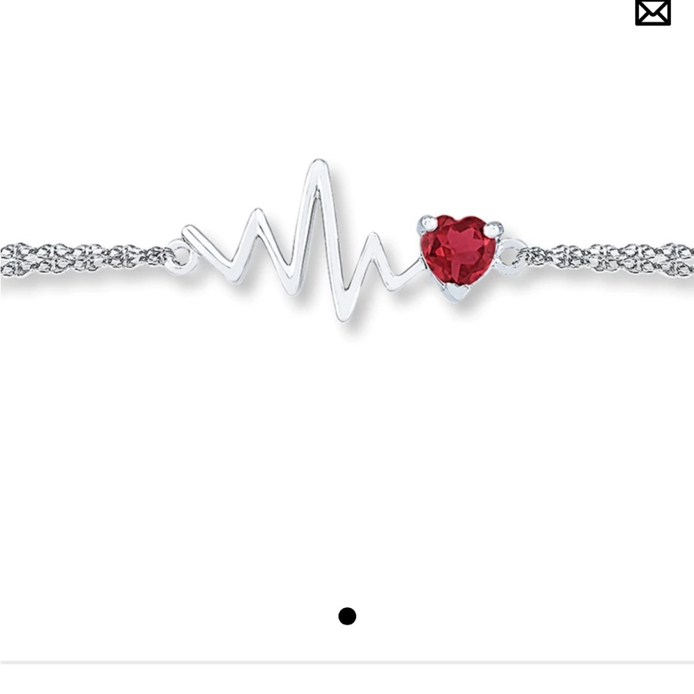 Kay Jewelers sterling silver heartbeat bracelet with Ruby stone